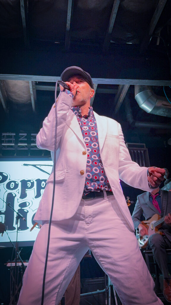 Steve Perry with Cherry Poppin' Daddies singing on stage at The Domino Room in Bend Oregon